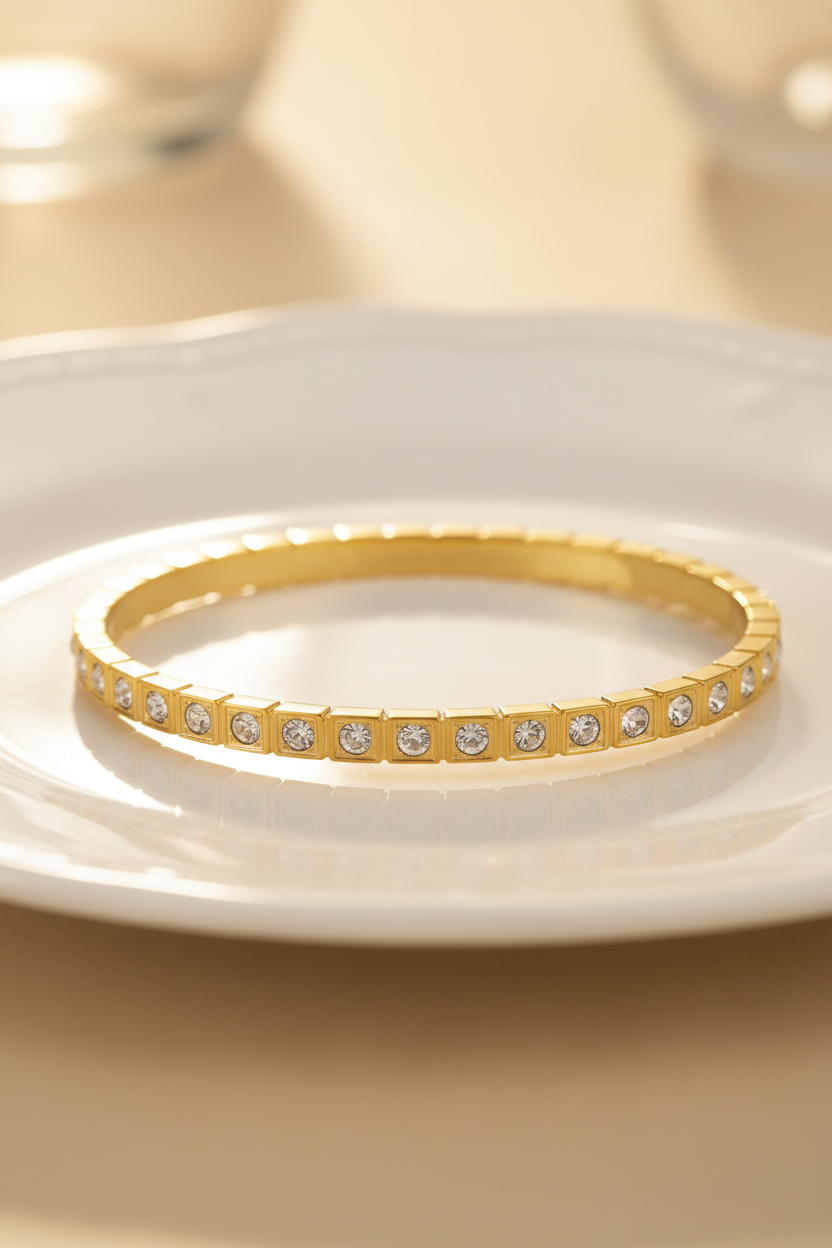 Gold Crystal Bangle on Ceramic Plate